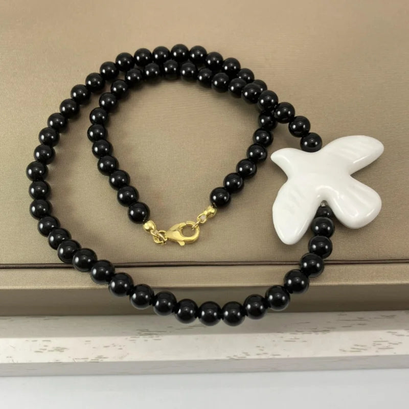 High-Grade White Ceramic Bird Peace Dove Pendant - Black Agate Bracelet/Necklace