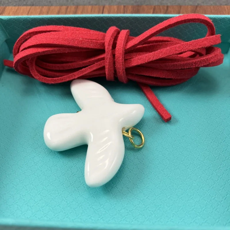 High-Grade White Ceramic Bird Peace Dove Pendant Necklace - Velvet Wax Rope