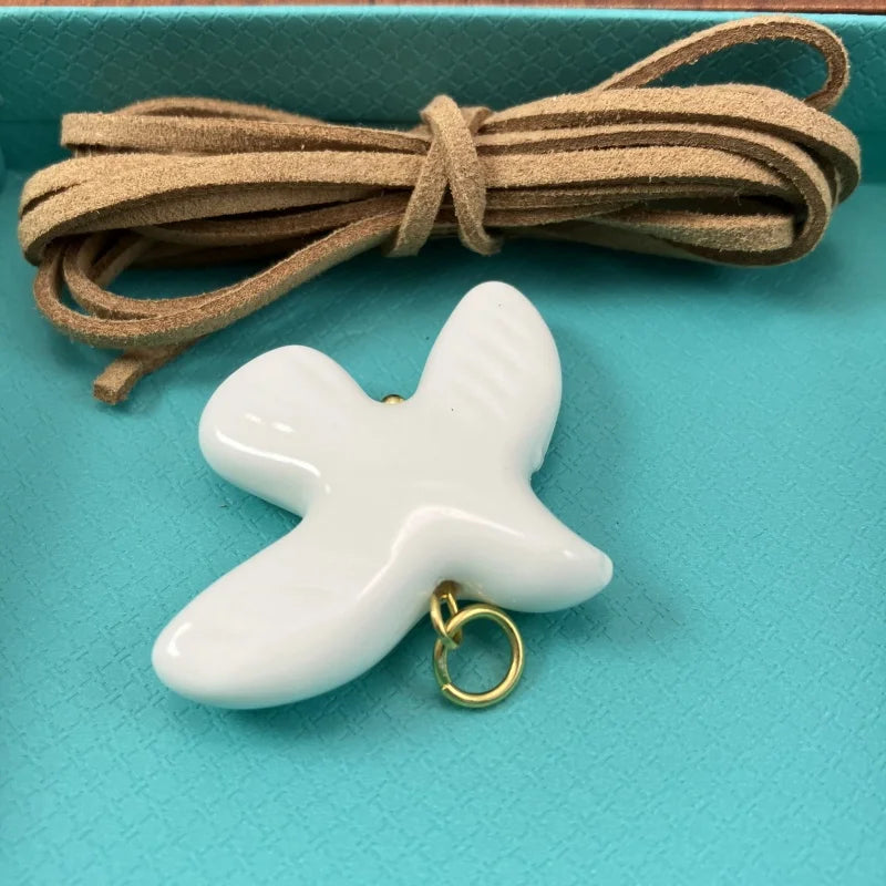 High-Grade White Ceramic Bird Peace Dove Pendant Necklace - Velvet Wax Rope