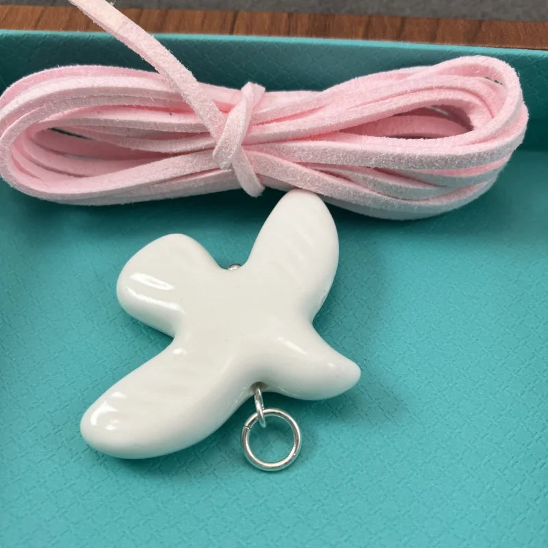 High-Grade White Ceramic Bird Peace Dove Pendant Necklace - Velvet Wax Rope