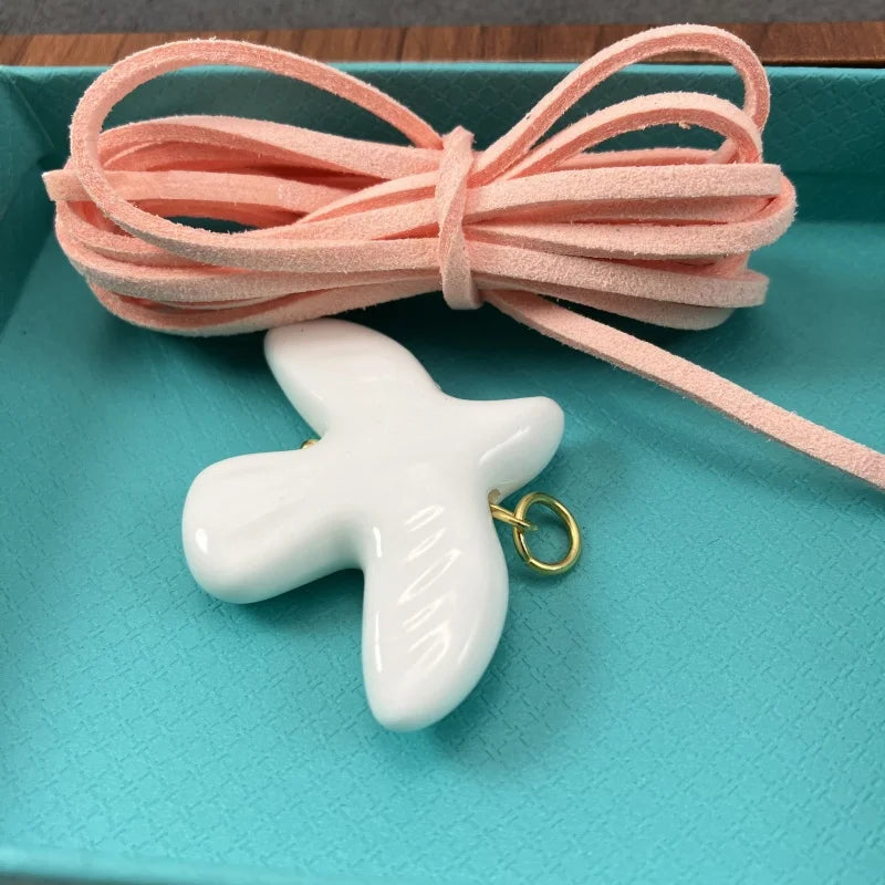 High-Grade White Ceramic Bird Peace Dove Pendant Necklace - Velvet Wax Rope