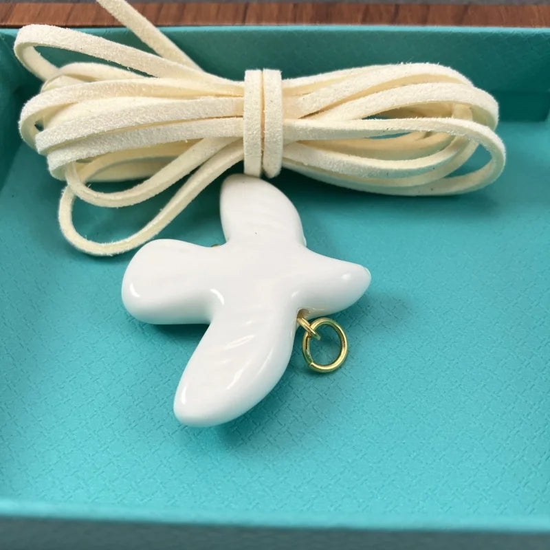 High-Grade White Ceramic Bird Peace Dove Pendant Necklace - Velvet Wax Rope