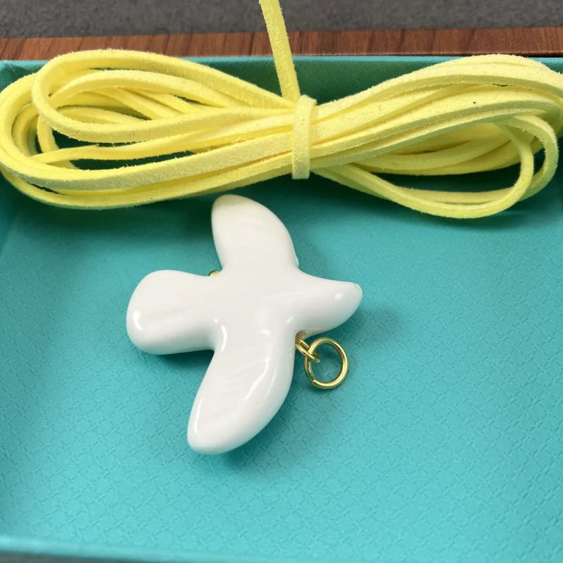 High-Grade White Ceramic Bird Peace Dove Pendant Necklace - Velvet Wax Rope